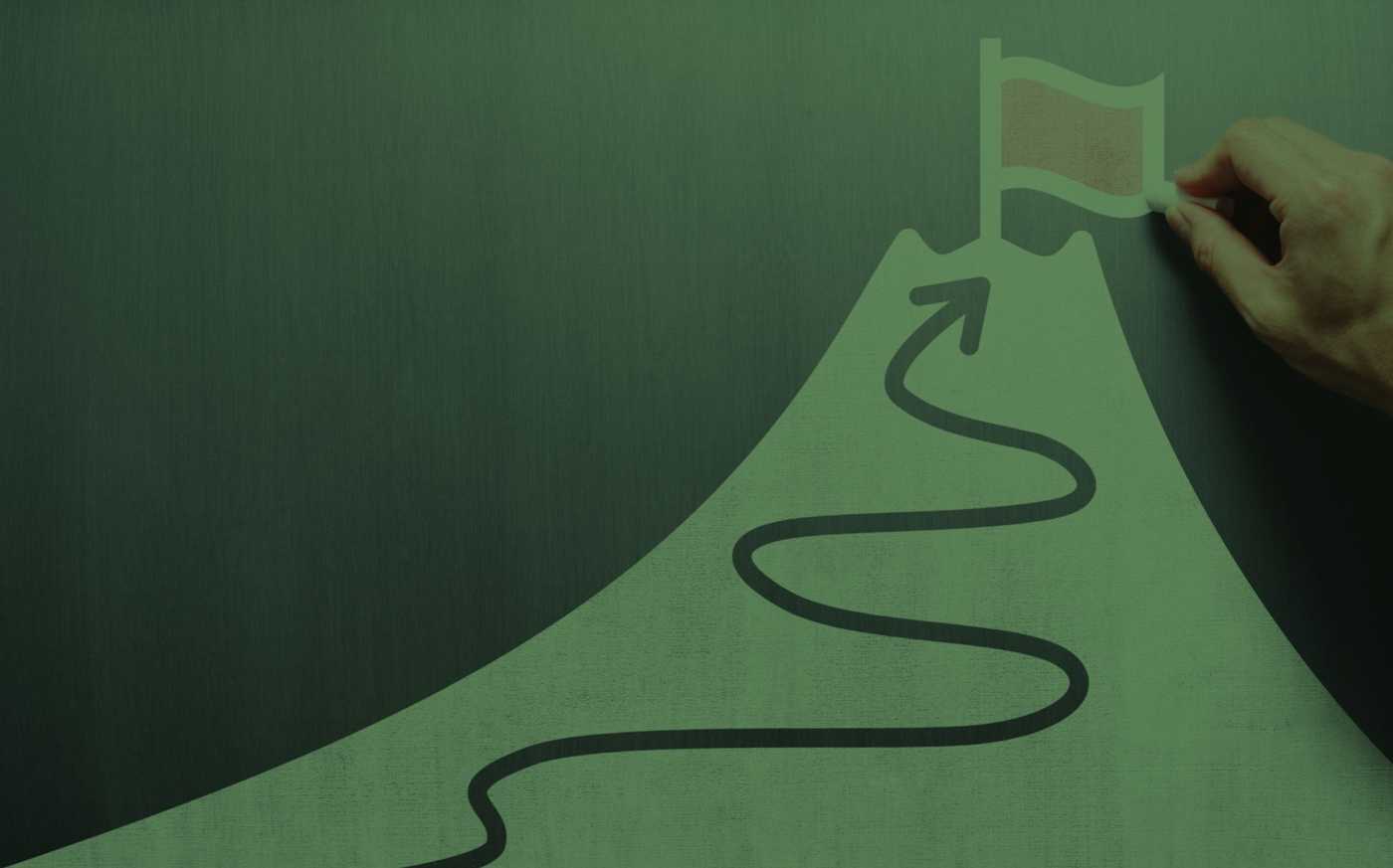 目標へ続く山道を描く手元